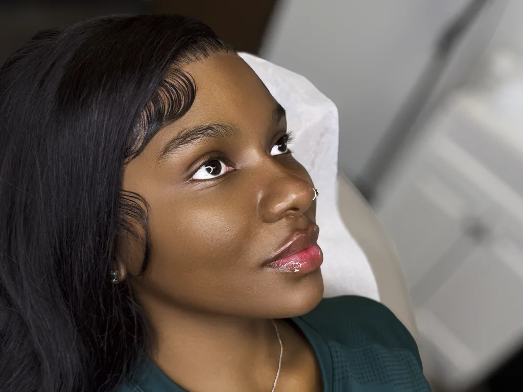 Photo Retouching Services Portrait photo of a woman with professional skin retouching and natural glow enhancement by Clarity Edit